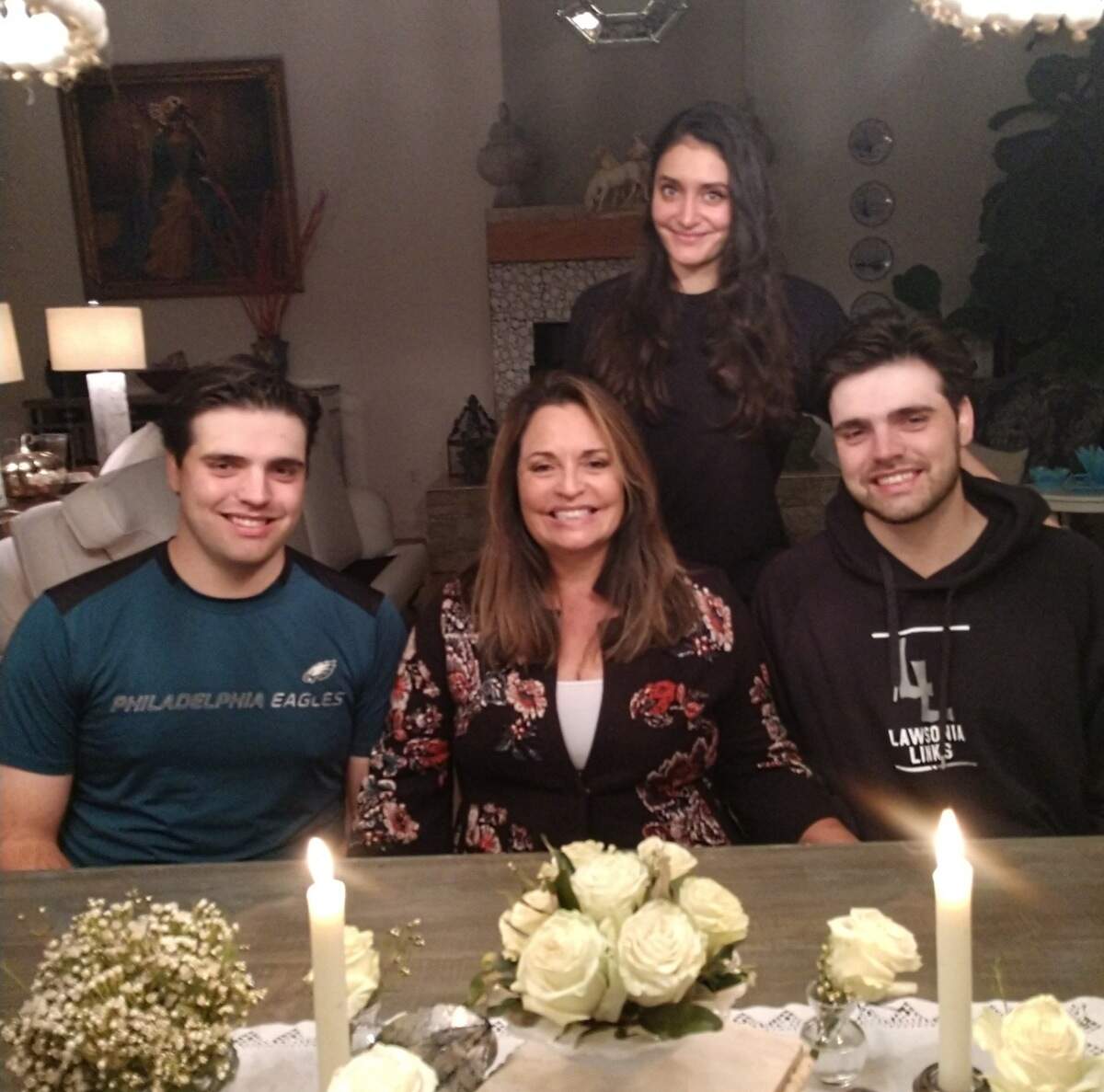 Niza Hall with her twin sons and daughter.