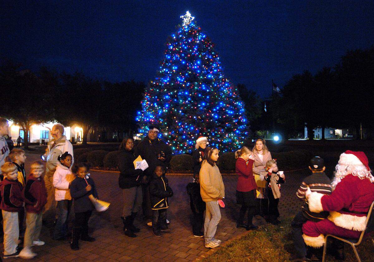 Children line up to meet Santa just after the Beaufort County Council's annual Christmas tree lighting in front of the Beaufort County Courthouse in 2011.