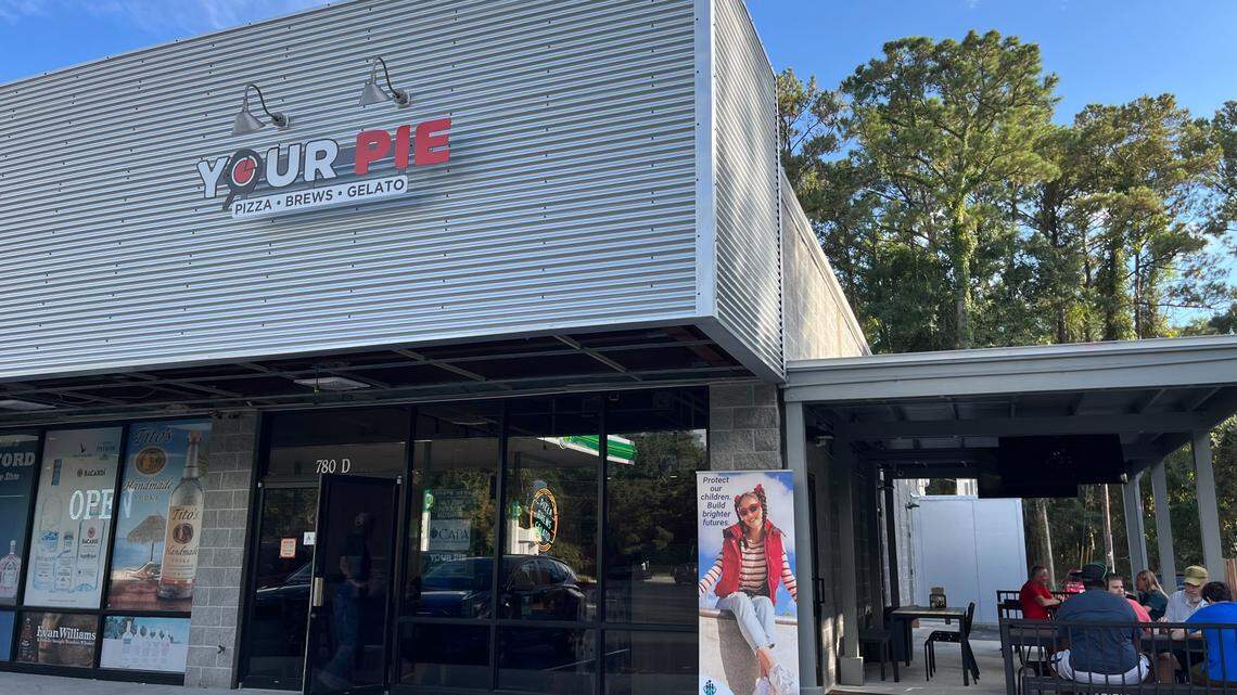 Exterior and expanded patio of the Beaufort, SC location of Your Pie, a fast casual pizza chain.
