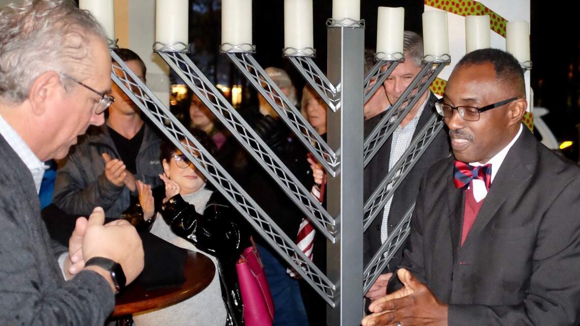 Tradition! A menorah, a Sippin Cow, Jewish and Christian clergy, and the Bluffton mayor