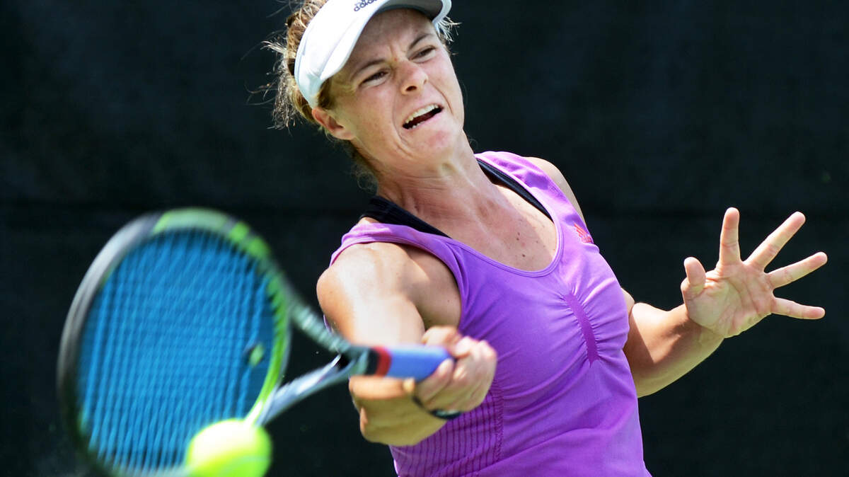 Michelle Sammons hits a return to Alexis King during their quarterfinal singles match in the Head Women's $10,000 USTA Pro Circuit Tournament on Friday at Van Der Meer Tennis Center on Hilton Head Island.