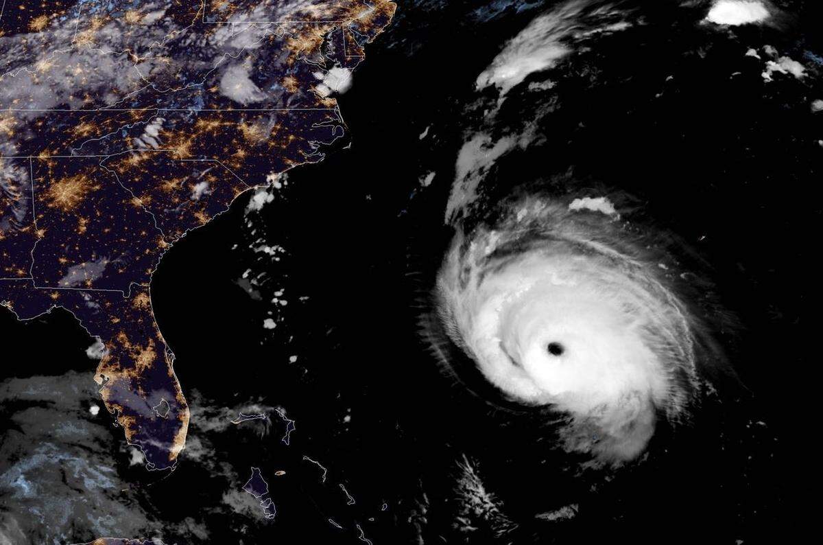Hurricane Florence spins off the East Coast of United States on Wednesday, Sept. 12, 2018, in this satellite image.
