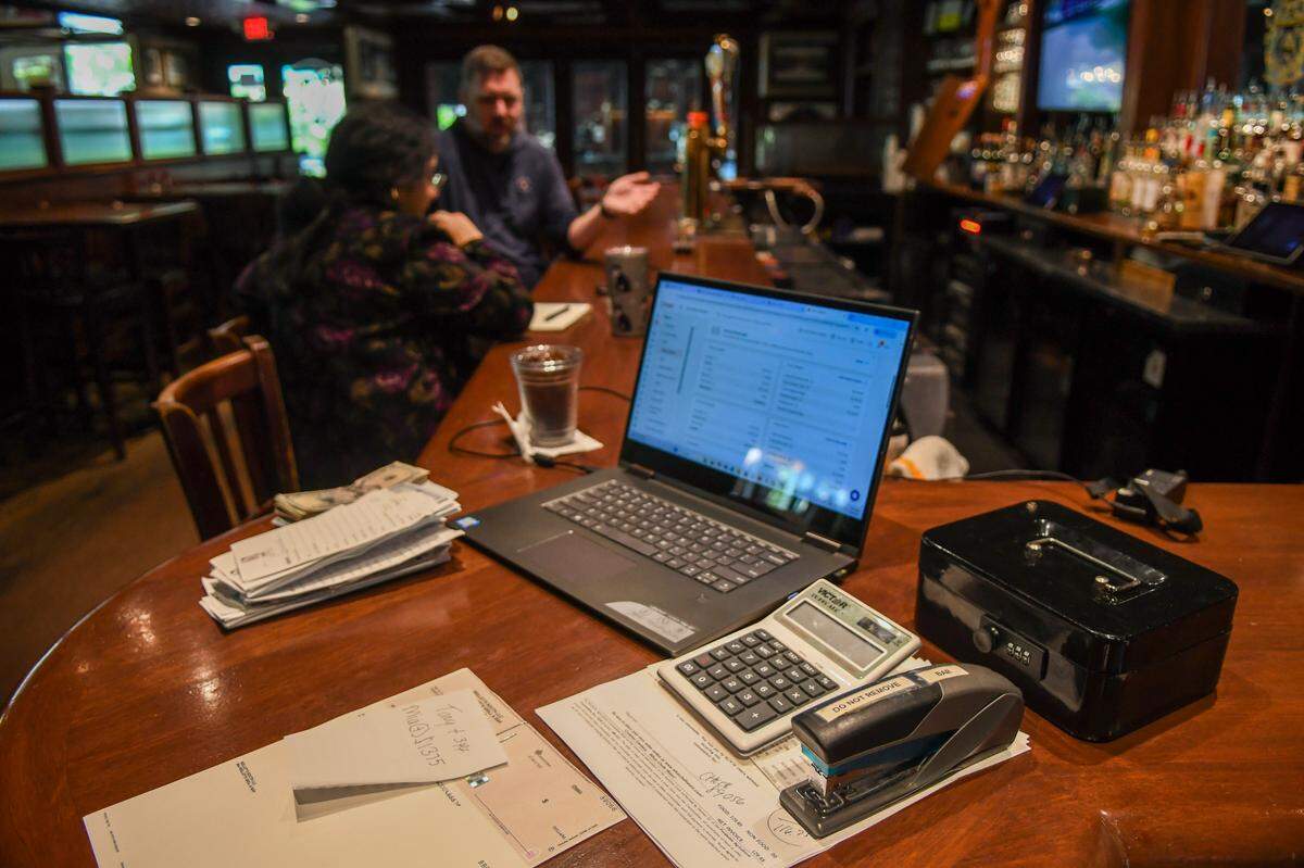 Staff at Reilley’s Grill & Bar set up the corner of the bar as Tom Reilley, namesake of the restaurant, would do every morning as photographed on May 8, 2025, on Hilton Head Island. Reilley would tune the televisions to sports - usually golf - and FOX News.