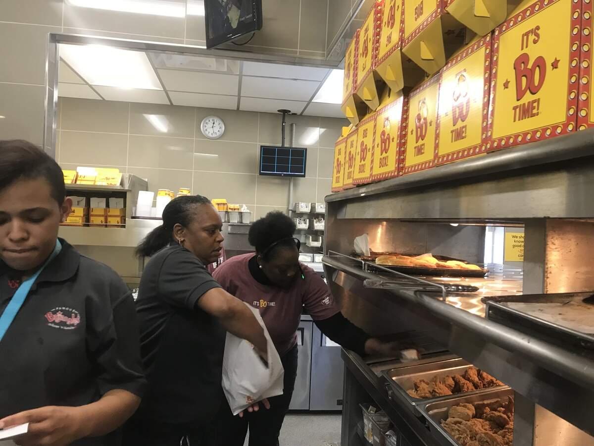 Karen Scott helps fill customer orders on Tuesday, April 17, 2018, inside the Bluffton, S.C., Bojangles she manages.