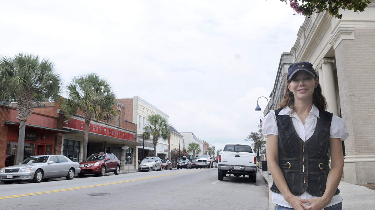 Barbara Terry, executive producer of Dream Coast Films, a Beaufort-based movie production company, stands on Beaufort's Bay Street in this file photo. Terry has announced that two feature films will be filmed in the city, but plans for the "Route 65 Nashville" movie have changed. It will no longer be shot in Beaufort, the director says.