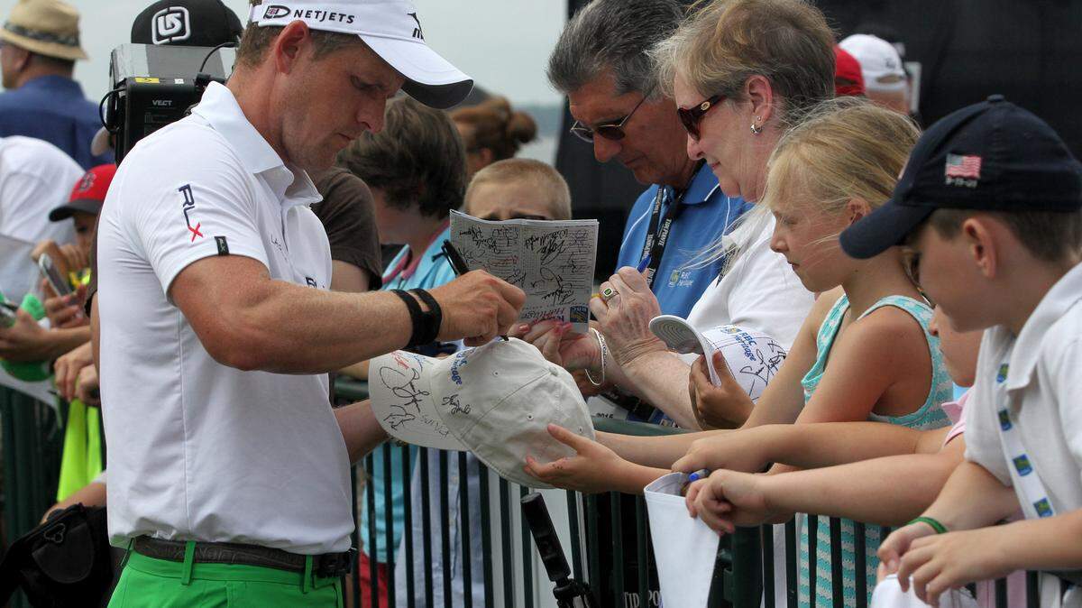 Luke Donald signs autographs after finishing play during the third round of the RBC Heritage Presented by Boeing on Saturday at Harbour Town Golf Links in Sea Pines on Hilton Head Island S.C.