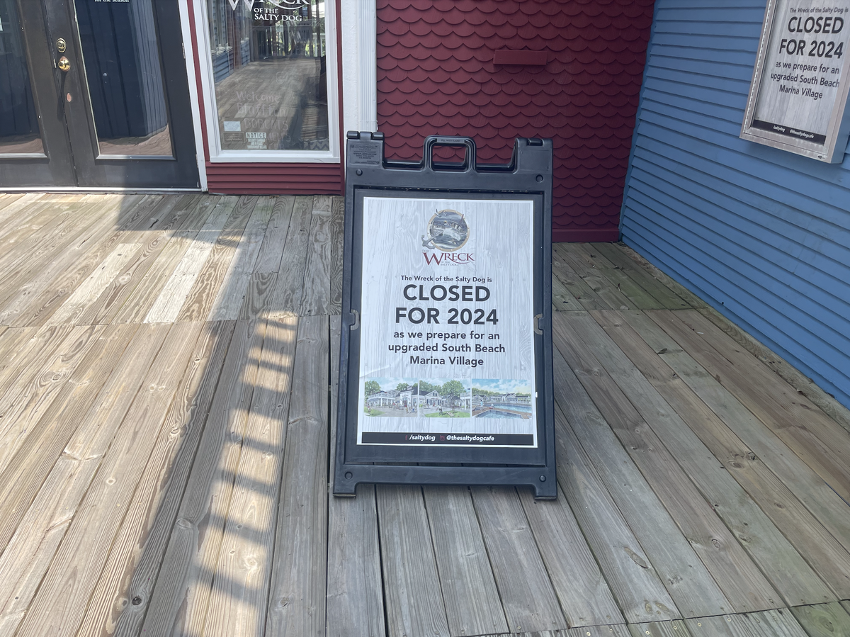 On Monday afternoon, reporters from The Island Packet visited the marina. Outside of The Wreck of the Salty Dog, a waterfront bar and café at the South Beach Marina, there are signs indicating the location is closed for the 2024 season in preparation for “an upgraded South Beach Marina Village.”