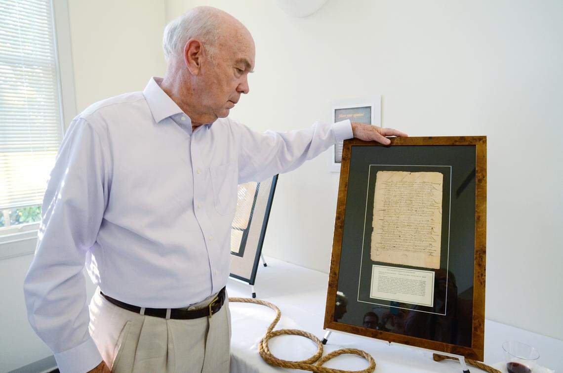 Santa Elena Foundation co-founder Daryl Ferguson photographed Oct. 8, 2015, with an item on display during the foundation's "Celebrate the Space" event in its new building -- the old Federal Courthouse on Bay Street. Plans call for the building's courtroom to be converted into exhibition space for the foundation’s museum.