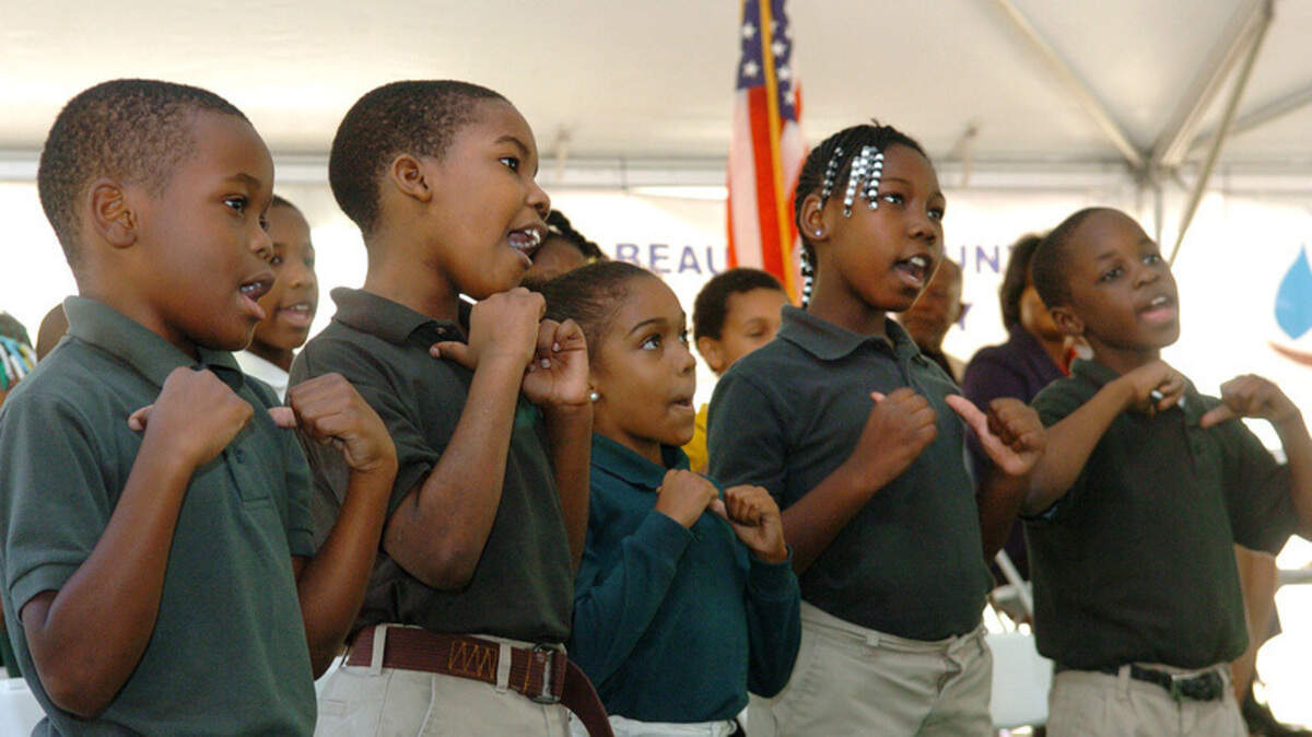 The St. Helena Elementary School Singers perform for the crowd gathered at a Groundbreaking Ceremony for the St. Helena Branch Library on St. Helena Island Thursday morning.  