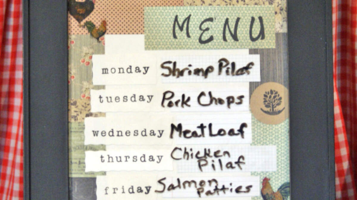 A framed Menu makes an eye-catching and serviceable addition to the kitchen.