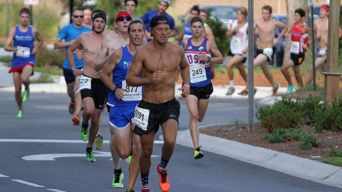 FILE: Sean Kelly of Annapolis, Md., leads the pack of runners during the 30th Annual Firecracker 5K Run and Walk along Shelter Cove Lane on July 4, 2015, on Hilton Head Island.  Kelly placed first overall in the 2015 race.