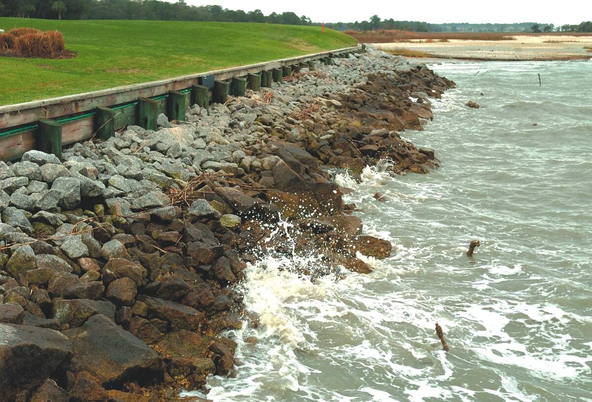 In 2007, engineers added large rocks to the barrier along the 18th green of Harbour Town Golf Links as an emergency measure to prevent erosion. Work on a permanent solution was scheduled to begin last summer, but was delayed until this year. When complete, this area will be covered, sloped and planted with marsh grasses.
