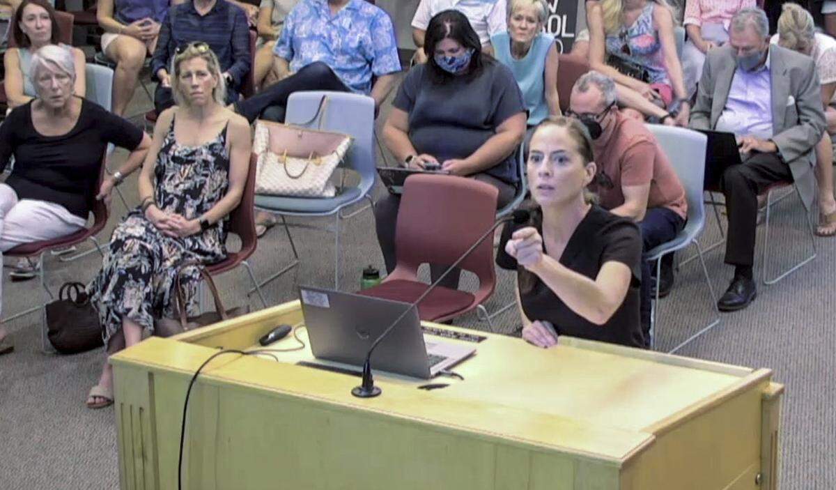 In public comment, a mother of three children addresses Hilton Head Island Town Council at an Aug. 17, 2021 meeting before members voted on an emergency order that allows the town to require masks in government buildings. While council has no jurisdiction over public schools, the woman voiced concerns about her children being forced to wear face coverings. “If you come for our kids, all bets are off,” she said, pointing her finger at the members.