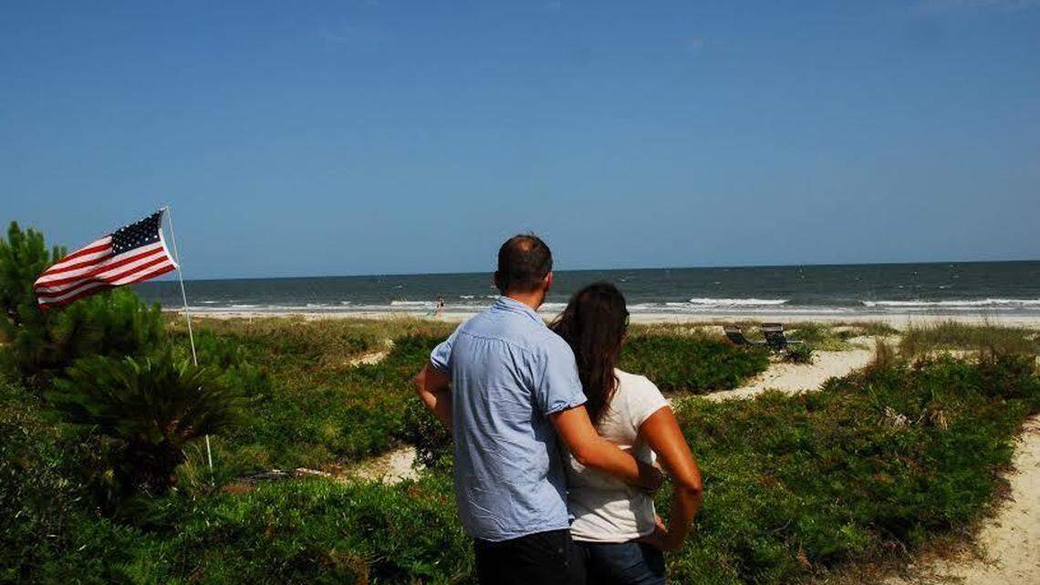 Bradford and Christina Zwetschke took in the view at the South Beach  home in Sea Pines where they are staying for one week courtesy of  Operation R and R, beginning June 13, 2015.