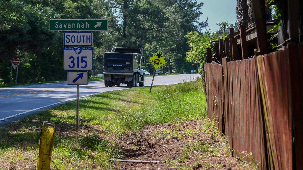 A hauler makes its way south on S.C. 315 on May 21, 2025 in Levy, S.C. The two-way highway is heavily traveled for those making their way from South Carolina to Savannah, Ga. A proposed sand mine for the area would use the highway for its trucks and equipment.
