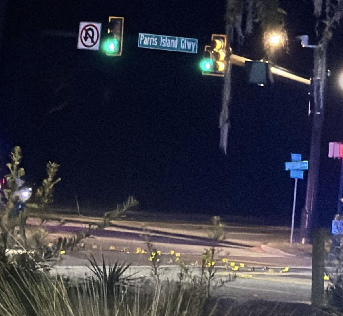 Beaufort County deputies marked shell casings with evidence placards after a Wednesday night shooting targeted a vehicle at the coroner of Parris Island Gateway and Trask Parkway. Two Beaufort teenagers in the car died shortly after when the vehicle crashed on its way to the hospital.