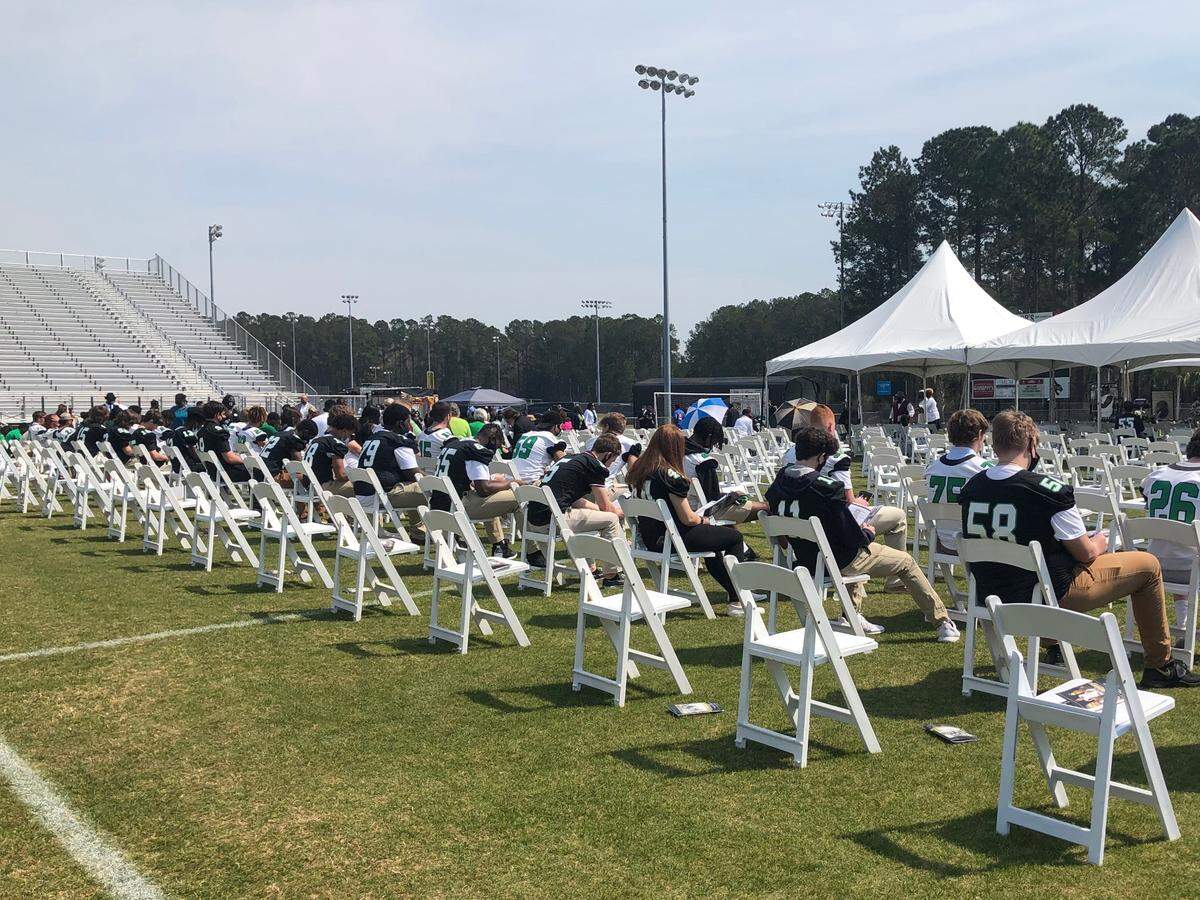 Teammates, classmates, teachers and coaches joined family Sunday, March 14, at Bobcat Stadium at Bluffton High School to memorialize Dwon “DJ” Fields Jr., 18, a senior who was shot to death March 5.