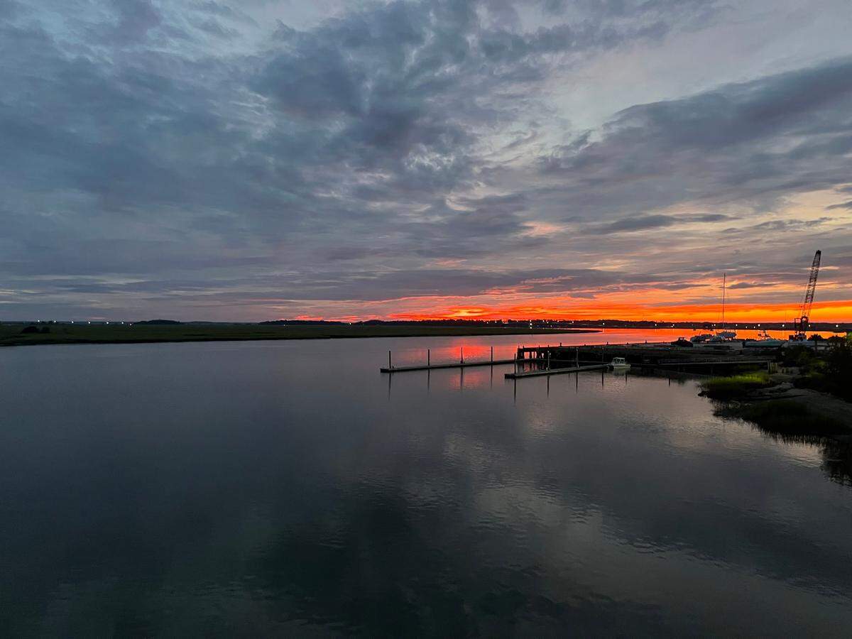 The dock and cranes of Safe Harbor Marina’s boat storage facility are visible from the town of Port Royal’s viewing tower. Safe Harbor and the town are trying to iron out differences over marina development plans on the shores of Battery Creek.