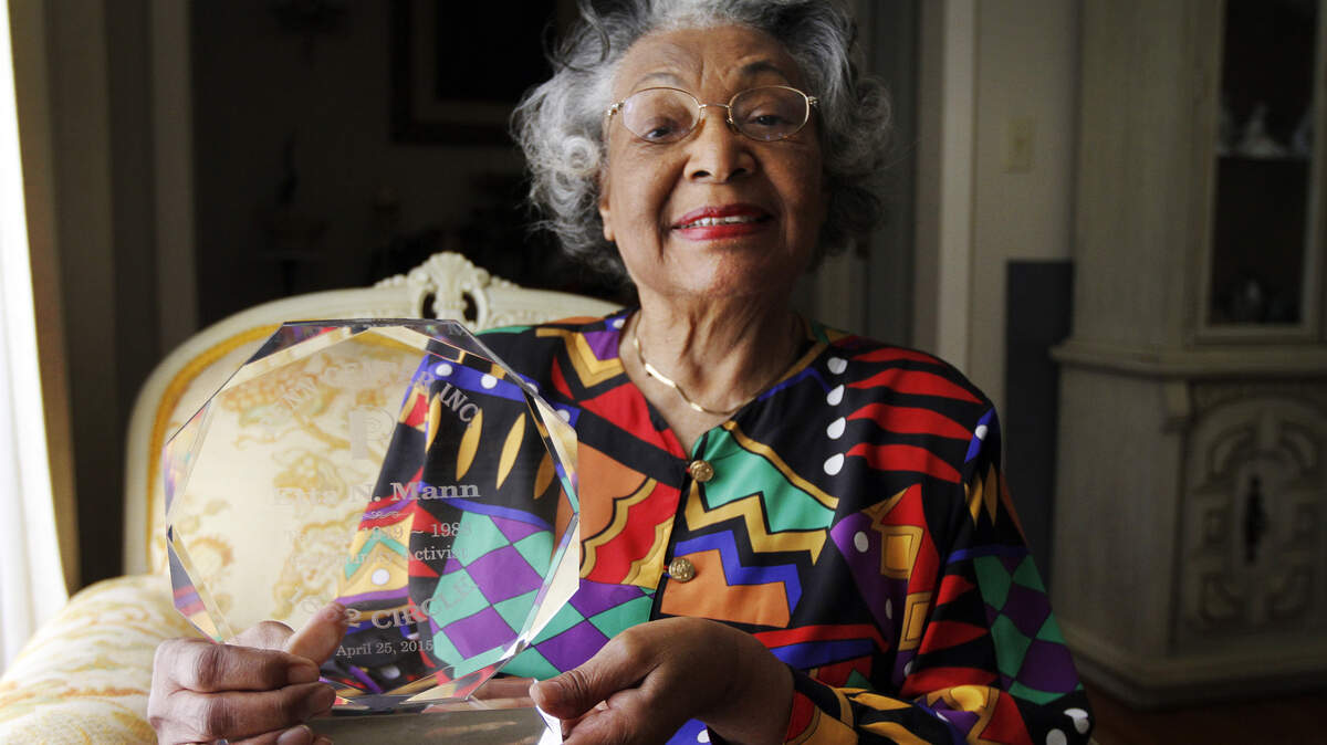 Etta Nickpeay Mann, a retired Beaufort educator, clutches her trophy while sitting for a portrait at her home on Lady's island on April 28, 2015.  Mann was just inducted into the Penn 1862 Circle.