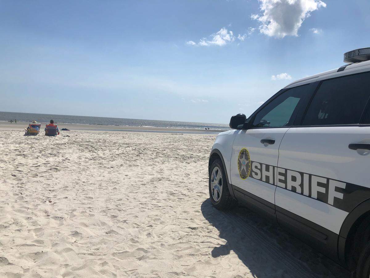 There were still beachgoers right off Coligny Plaza on Saturday, March 21, after Hilton Head Island mayor John McCann’s order to close beaches for 60 days went into effect. A Beaufort County Sheriff’s Office officer patrolling the area said it was “nearly impossible” to tell who had come from public and private access points, and that he was focused on “keeping order.”