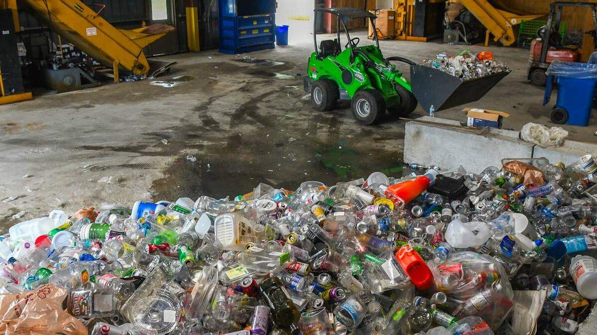 A pile of plastic, glass and aluminum waits to be sorted on July 12, 2024 at i2recycle’s facility located in the Hardeeville Industrial Park in Hardeeville, S.C.