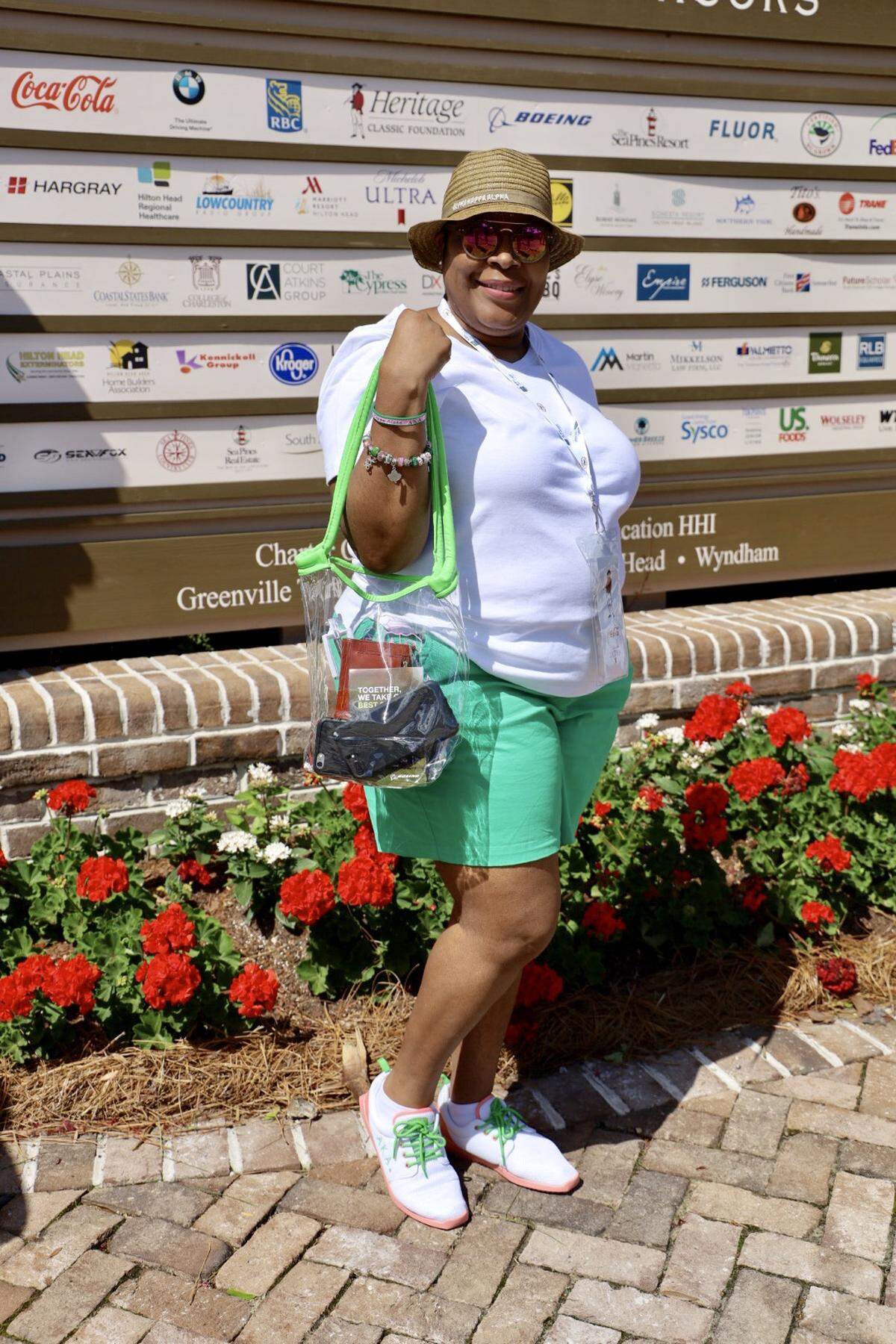 Jun is visiting from Columbia. This year is her first time attending Heritage. She said she wasn’t quite sure what to expect but, so far, thought it to be a very nice, wonderful event. Jun creatively and flawlessly tied her outfit together by matching her purse, shoestrings and shorts.