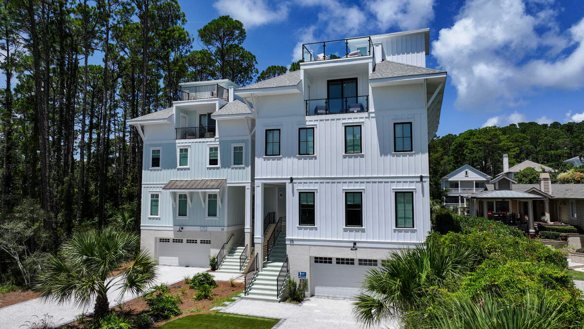 These luxury homes recently built on Bradley Circle on Hilton Head Island have signage on them as luxury vacation rentals or short term rentals - what the Town of Hilton Head Island describes as a residential property rented under 30 days.