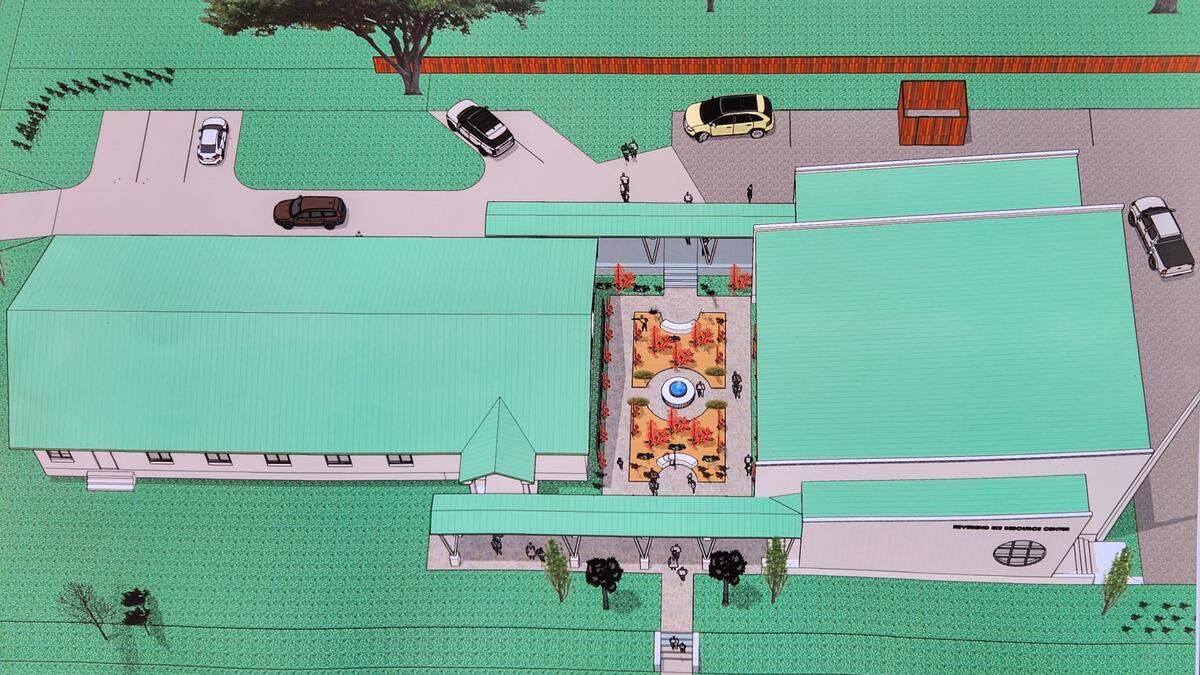 An architect’s rendering of the future Rev. Ike Resource Center, right, attached to the existing United Church separated by a garden. On Tuesday, Nov. 28, 2023, Rev. Ike’s family members, church members and friends attended a ground breaking for the future center.
