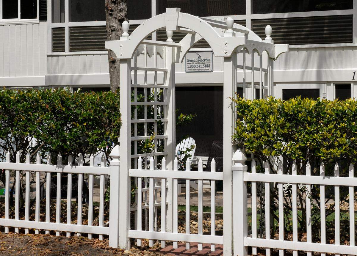 Many homes in the North Forest Beach are dotted with signs announcing their rental companies like this Ibis Street home on Hilton Head Island photographed on Thursday, April 1, 2021.