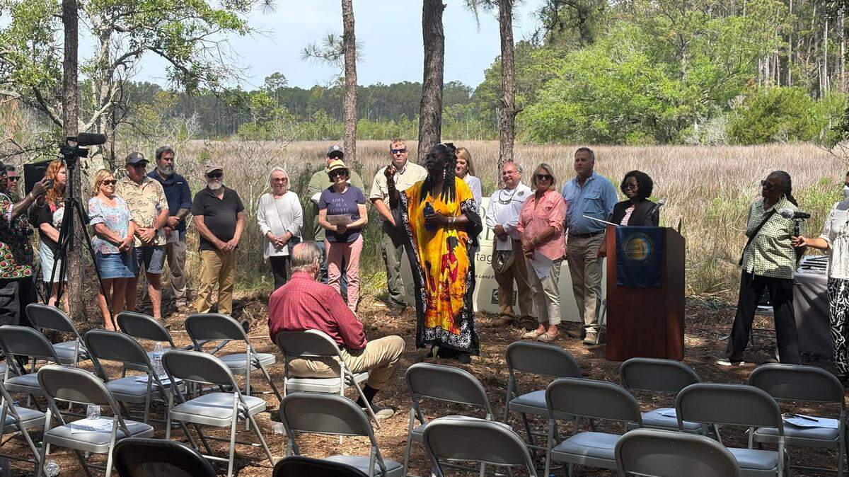 Queen Quet, chieftess of the Gullah/Geechee Nation, speaks at the dedication ceremony for the Coosaw Sea Island Cotton Heritage Preserve