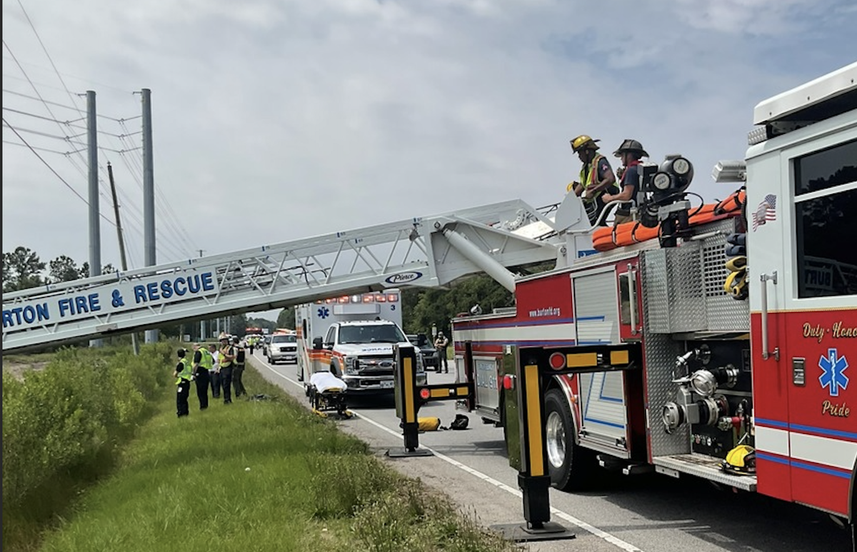 First responders from the Burton Fire District used the fire engine’s ladder to rescue a woman who drove into the marsh just after 11 a.m. Tuesday.