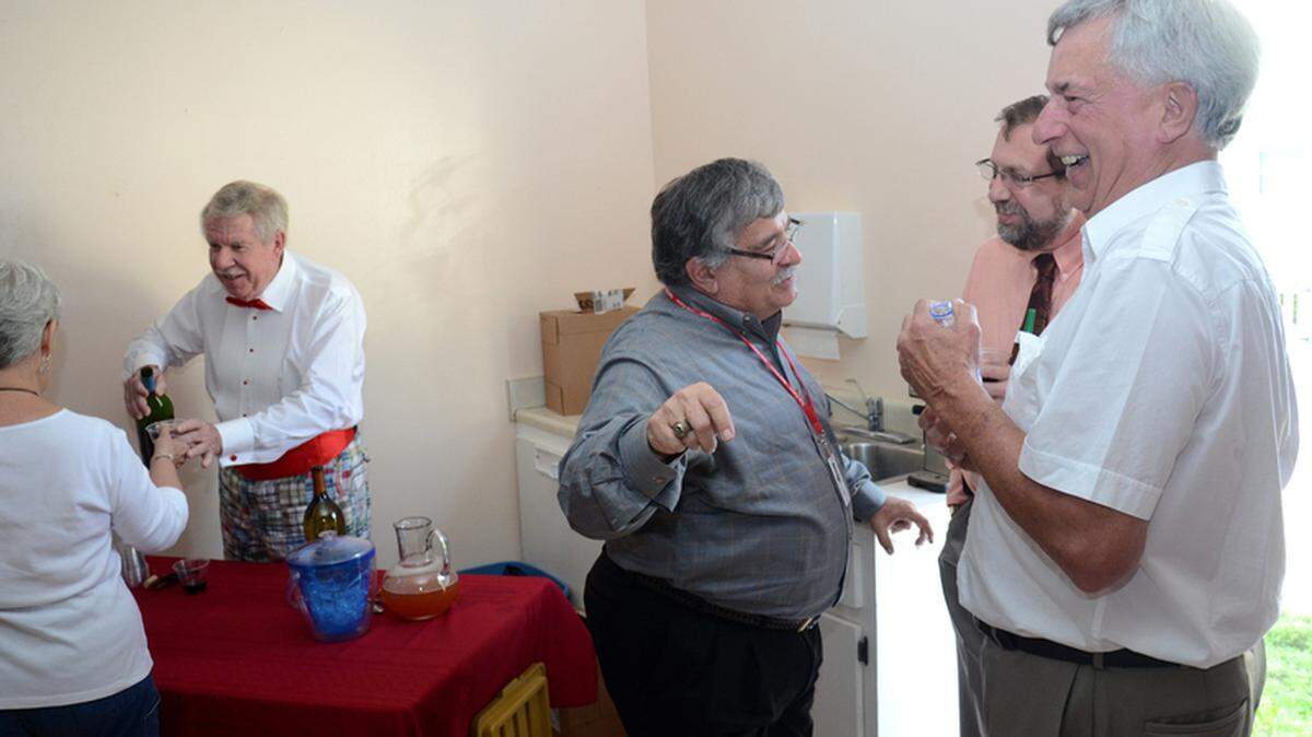 Andy Corriveau, chairman of the City of Port Royal  design and review board chats with councilman Joe Lee, right, and  Hilton Head Island town manager Steve Riley, back right, Wednesday  afternoon during Java with Joe at The Shed in Port Royal. The weekly  gathering organized by Lee allows for an informal way to discuss  community issues and events.