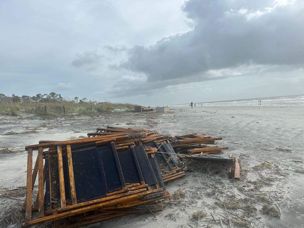 Shore Beach Service, the island’s privately contracted beach patrol, secured rental chairs to posts near the sand dunes on Coligny Beach in anticipation of strong winds from Helene. Despite the continuing gusts Friday morning, walkers and bicyclists were plentiful on the low-tide sands.
