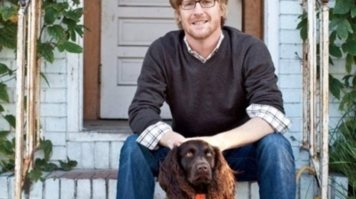 David DiBenedetto, editor-in-chief of Garden & Gun, is pictured with Pritchard, a Boykin spaniel. DiBenedetto will sign copies of "Good Dog: True Stories of Love, Loss and Loyalty" on Dec. 6 and 7 at Garden & Gun magazine's Jubilee in Charleston.