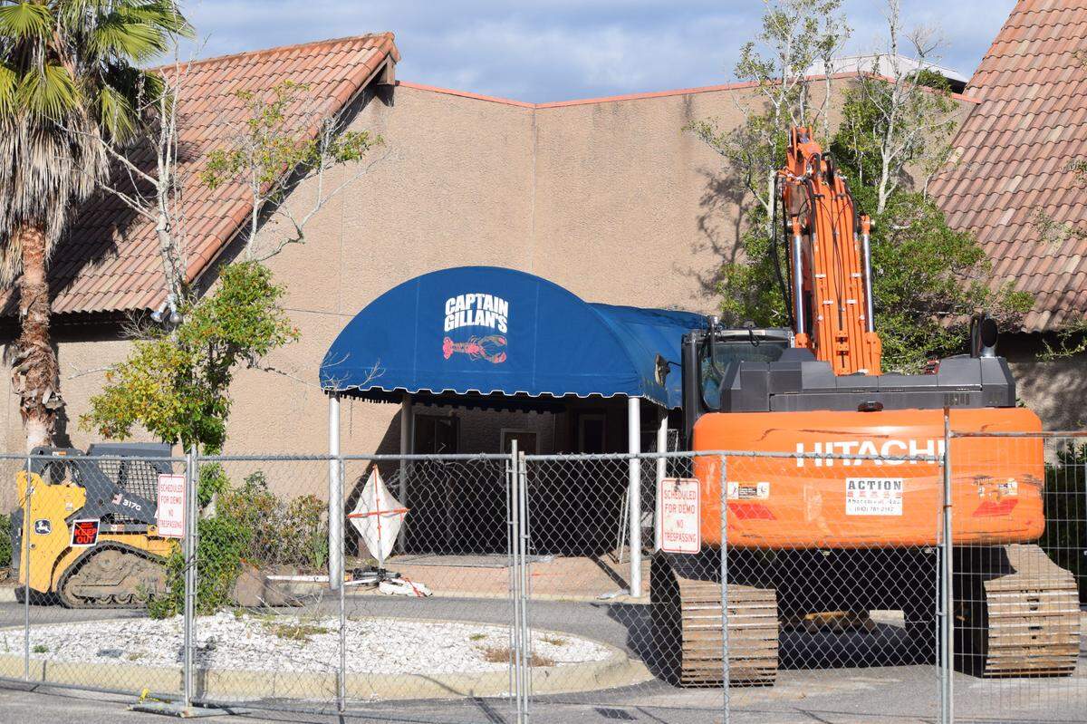 An excavator and compact track loader were parked at the old Kingfisher restaurant building on Hilton Head Island on Tuesday, Nov. 2, 2021.