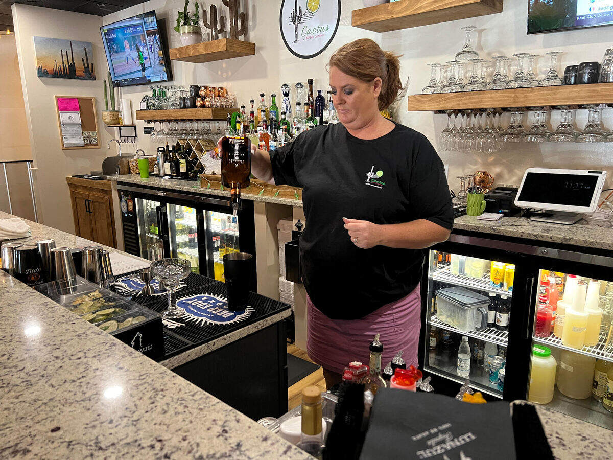 Lauren Jordan prepares a margarita with fresh-squeezed lime juice at Cactus Street Cantina on Hilton Head.