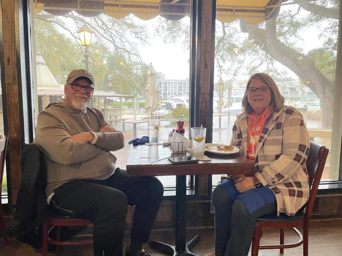 Dave and Diane Switzer are vacationing here in Hilton Head for the first time ever. Today is the second day of a weeklong vacation they planned months ago hoping to get away from the snow in their home of Ashland, Ohio. Taken at the Crazy Crab in Harbour Town.