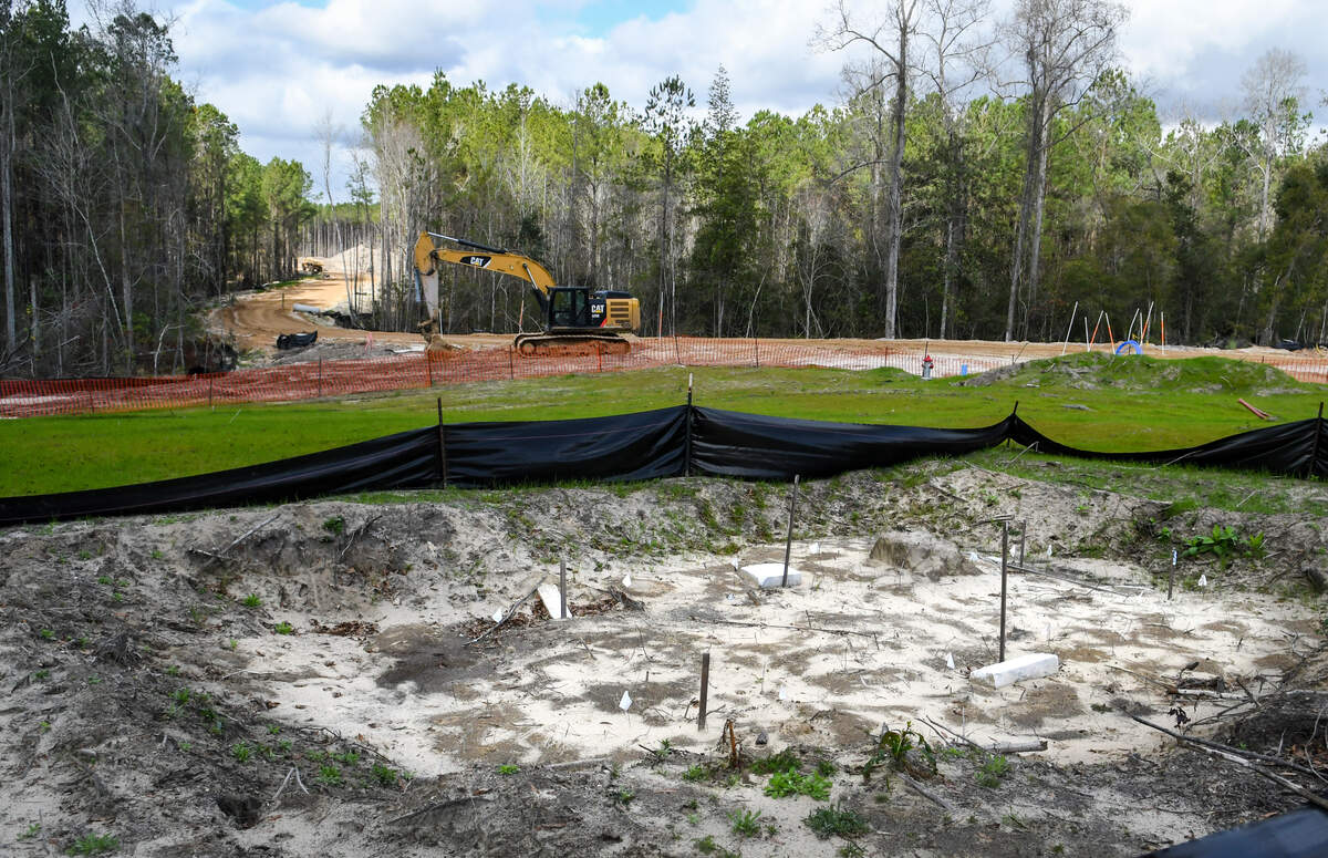 Wooden stakes mark the locations of three graves unearthed in July within a commercial area of Bluffton’s Cypress Ridge master plan, as seen on Wednesday, Jan. 16, 2020. These recently found graves sit a few hundreds northeast of an existing graveyard located along SC 170 north of the SC 46 traffic circle in Bluffton. Family members contacted say the graveyard is named Pritchardville Cemetery and buried in the known portion of the cemetery is the pastor of St. Matthews Church.