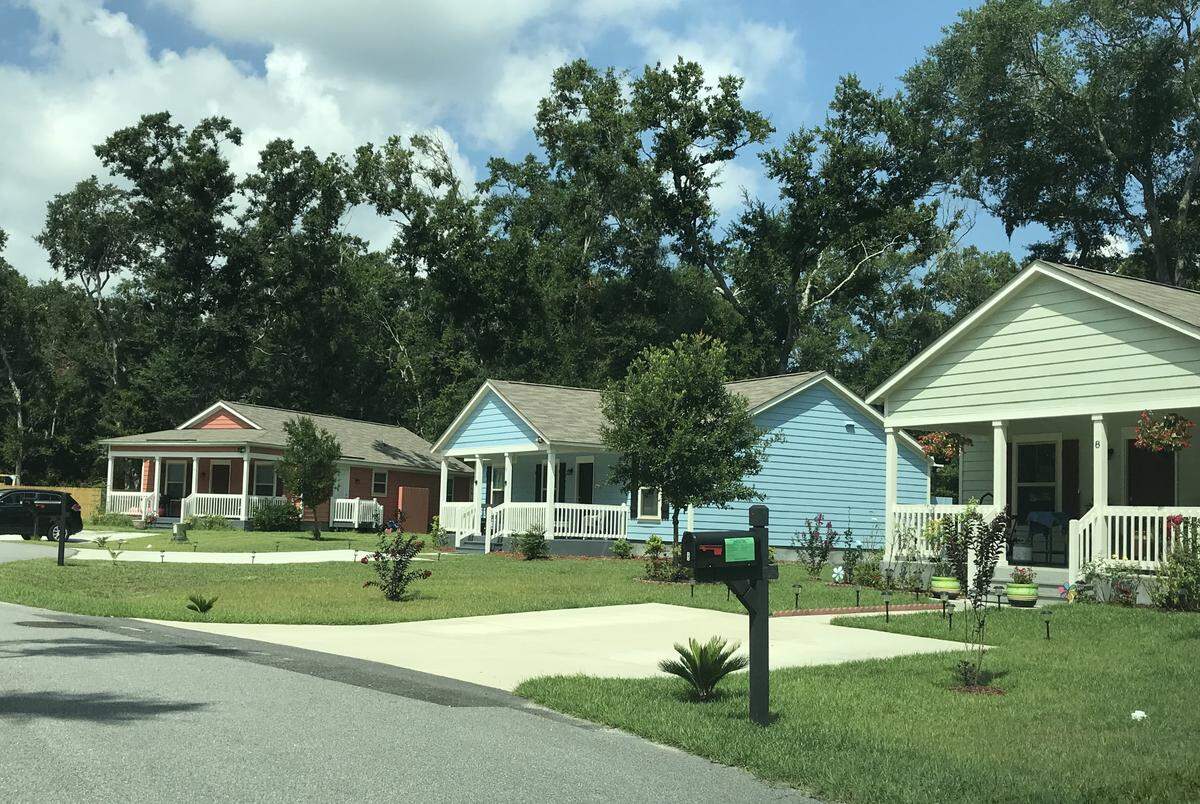 Three homes constructed as part of phase one of The Glen, an affordable housing community off Marshland Road.