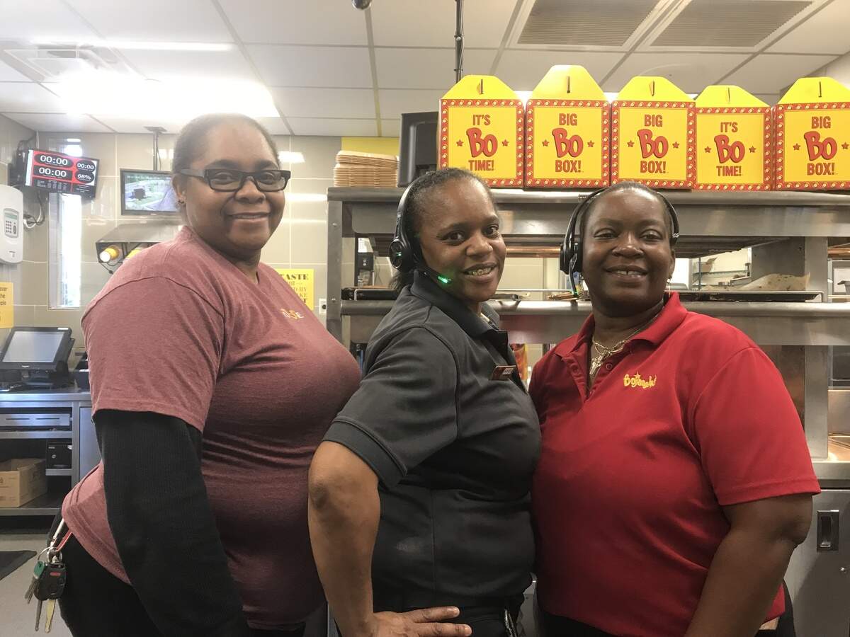 From left, Trevon Shabazz, Karen Scott and Tina Harrison pose for a picture on Tuesday, April 17, 2018, at their Bluffton, S.C., Bojangles store.
