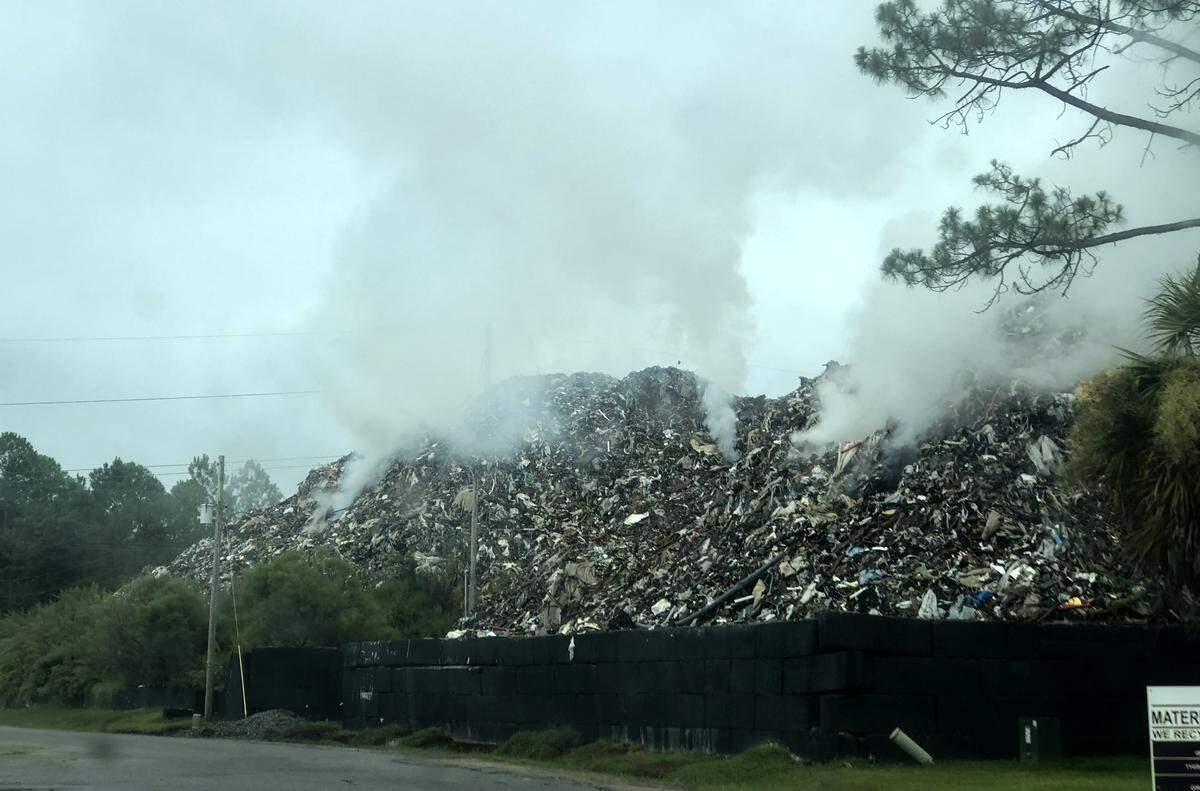 Smoke bellows from Able Contracting’s Material Recovery Center on Friday morning located on Schinger Ave. in Jasper County. On Wednesday evening, the S.C. Department of Health and Environmental Control issued a “Notice and Emergency Order” that stated the conditions at the recycling center “present an imminent and substantial danger to human health and the environment.”