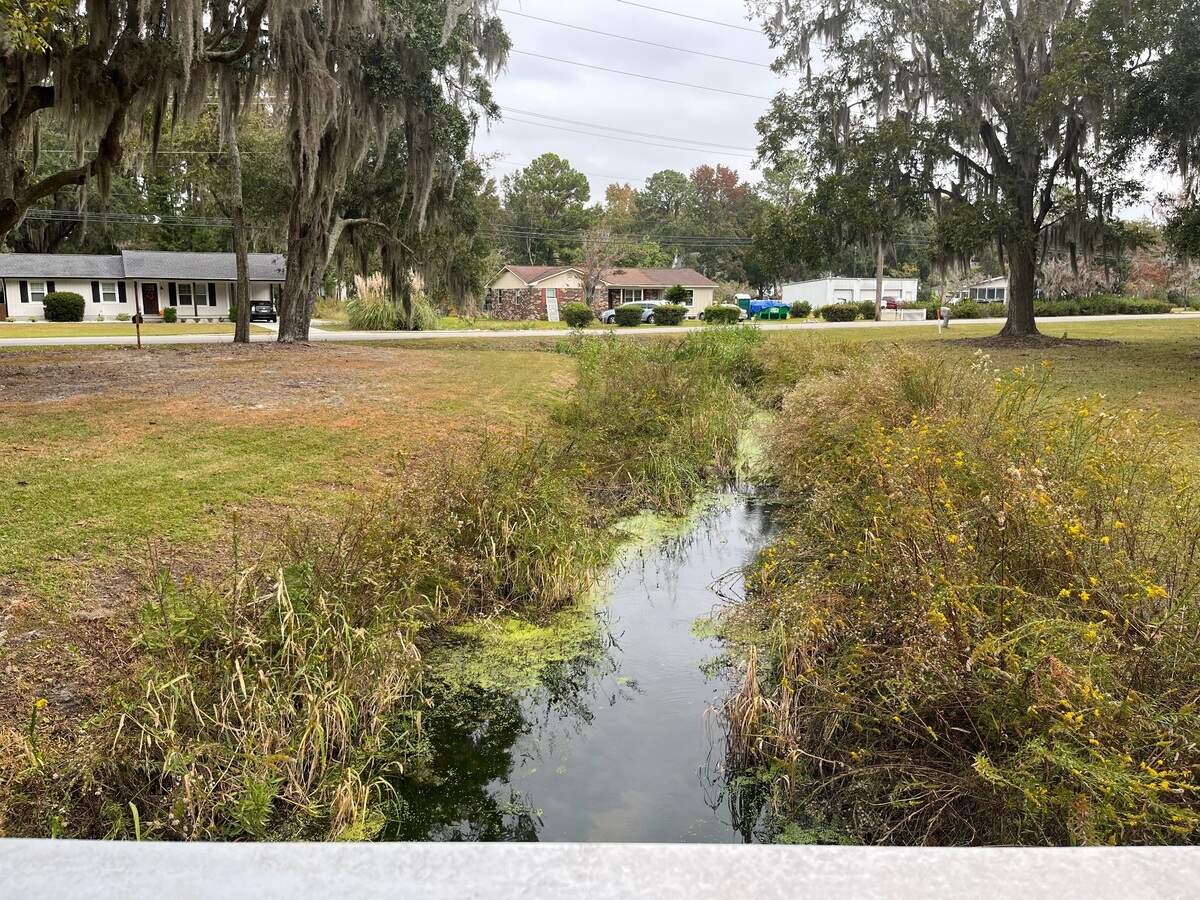 Feeder ditches such as this one in Southside Park in Beaufort will drain better following a creek dredging project the city is planning in the area.