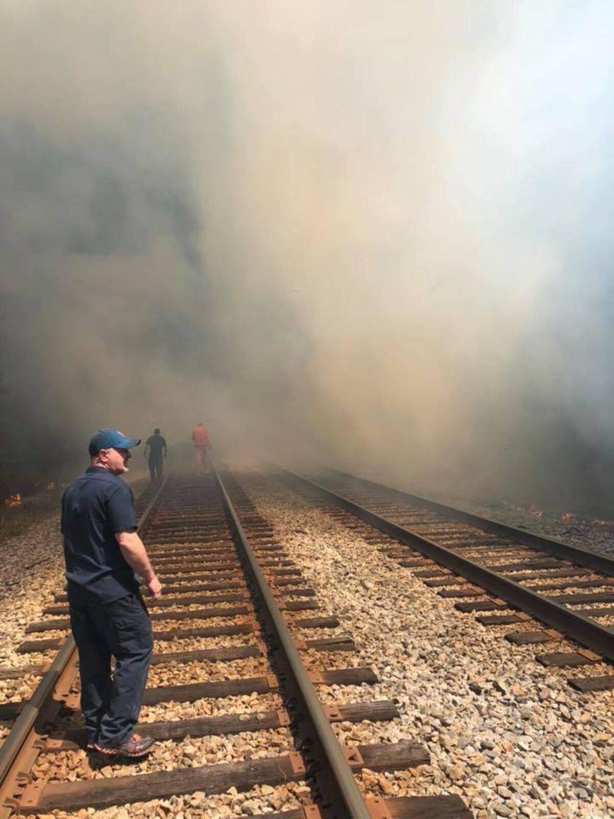 James Lavine's view of the military plane crash near Savannah after he exited his car and walked over to the train tracks parallel to Georgia Highway 21 on May 2, 2018.