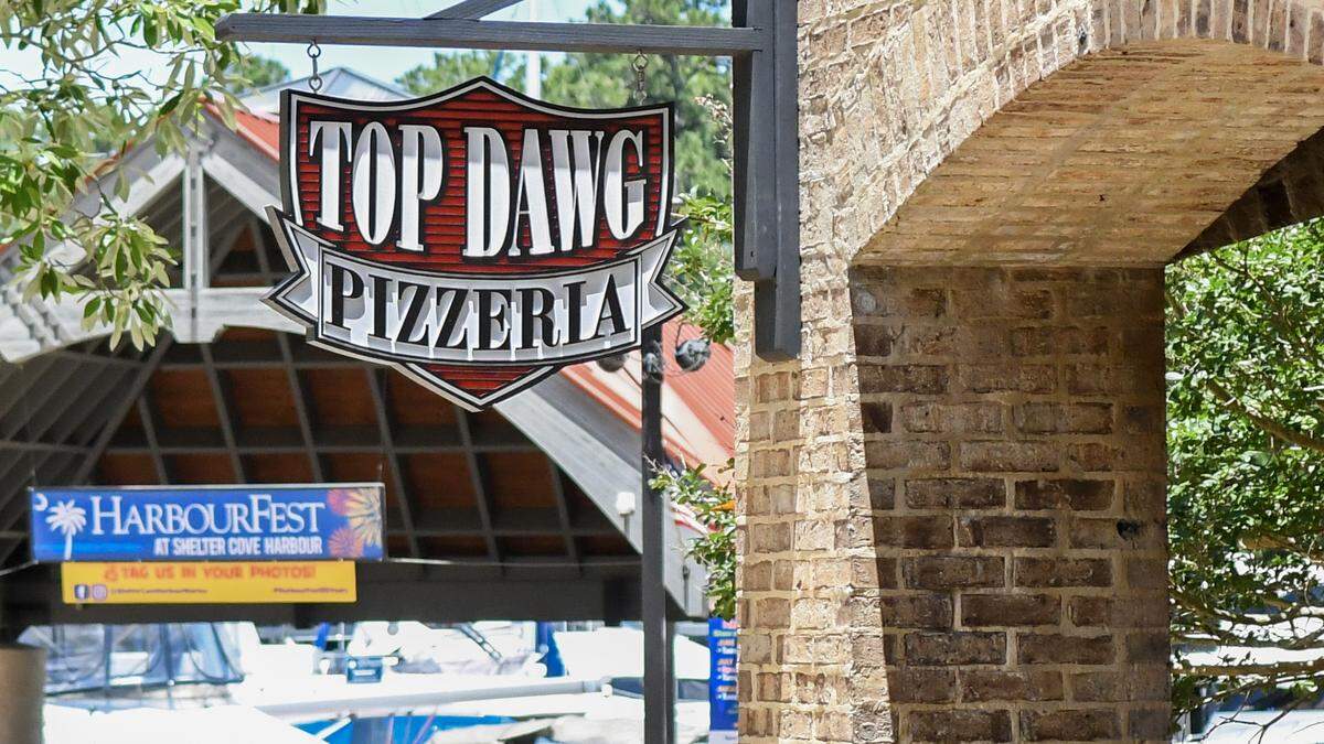 An expansion of Top Dawg Tavern now includes a pizzeria, each having an outdoor patio, located in Shelter Cove Harbour and Marina on Hilton Head Island.