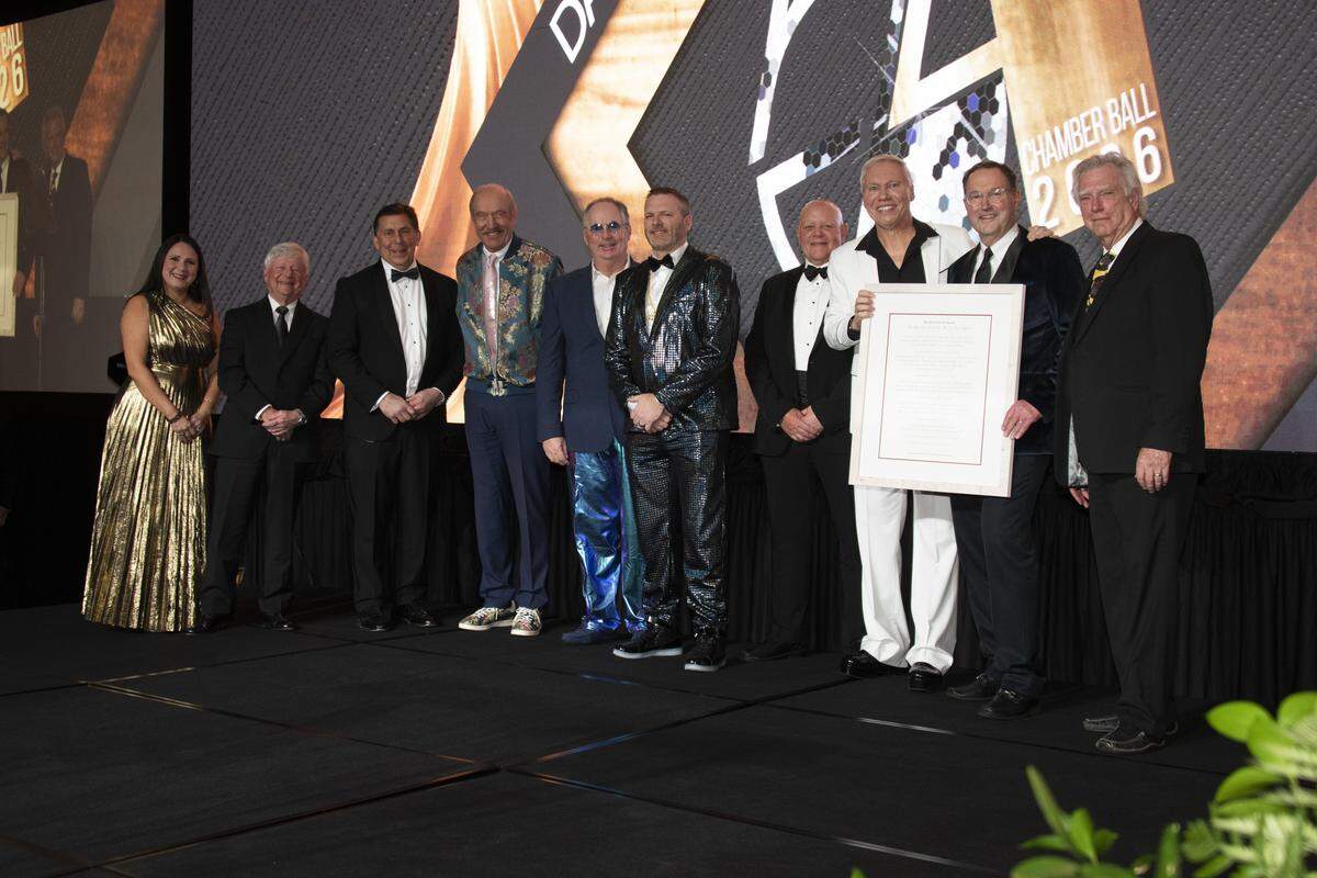 The Sea Pines Resort and its parent company, The Riverstone Group, received the Chamber’s top business award at the 2026 Chamber Gala. From left: Susana Cook, Cary Corbitt, Steve Wilmot, Stan Smith, John Ferrell, Dennis Basinger, Simon Fraser, Bill Miles, Steve Birdwell and Gregg Russell.