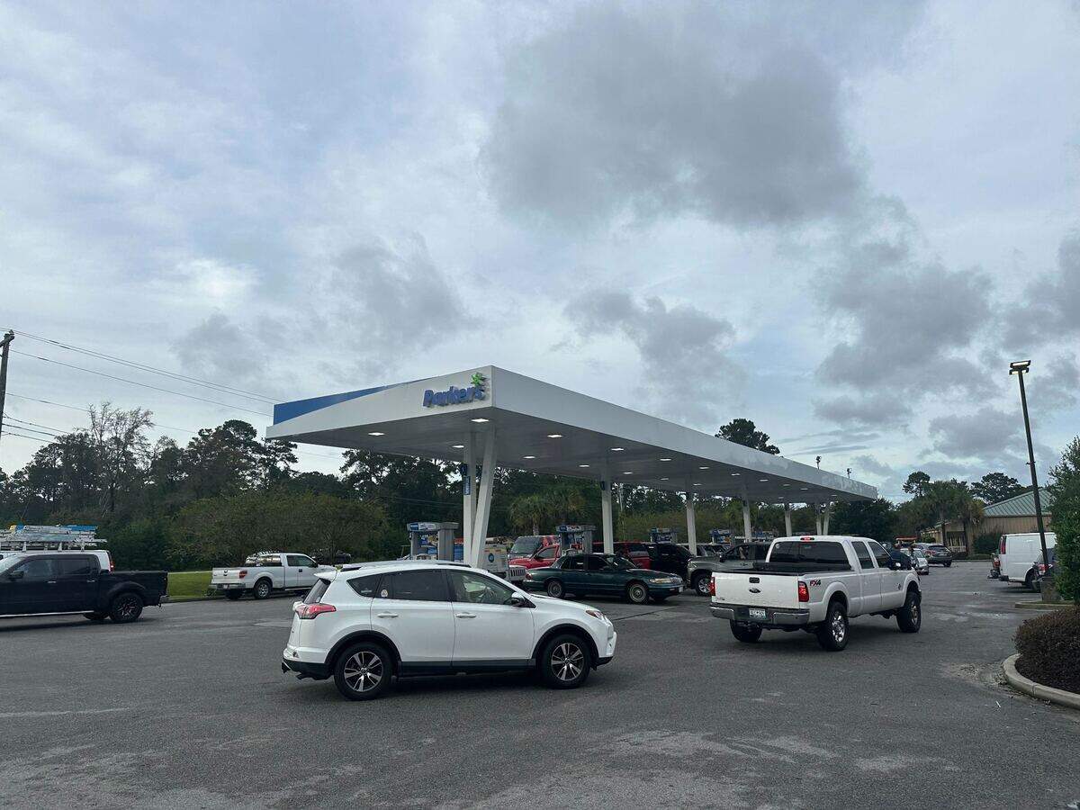Cars are seen lining up for gas around 8:30 a.m. Monday at the Parker’s convenience store on S.C 170 near Callawassie Drive, in Beaufort County, South Carolina.