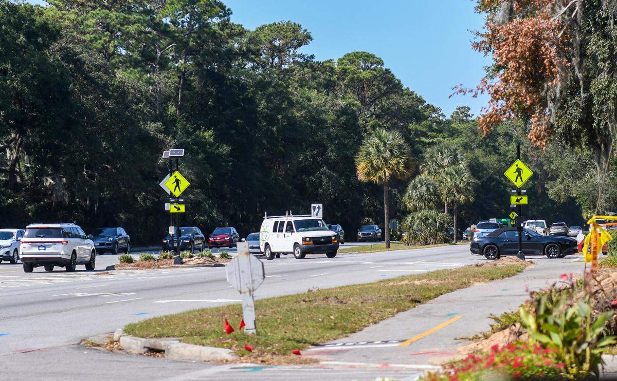 Pictured are several pedestrian crosswalk signs posted at Northridge Drive on William Hilton Parkway with attached Rectangular Rapid Flashing Beacons (RRFB). Pedestrians will soon have the ability to activate the flashing beacons, alerting drivers that they would like to cross the eight-lane highway.