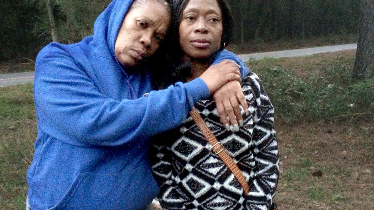 Cynthia Howard, left, embraces Patricia Jenkins on Oct. 16, 2015. Howard and her mother, not pictured, were in an Oct. 23 car crash in which her mother was killed. Howard also is the mother of Bruce Specks, whose body was found in a burned car with his girlfriend Shantay Jenkins on Purrysburg Road in Hardeeville on Oct. 3. Patricia Jenkins is Shantay Jenkins' mother. 