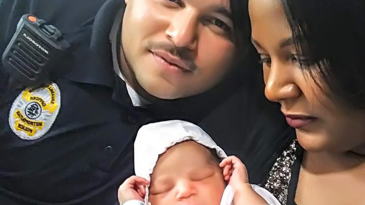 Candice Simplis-Paige and her husband, Marcus, with their newborn baby at Coastal Carolina Hospital.