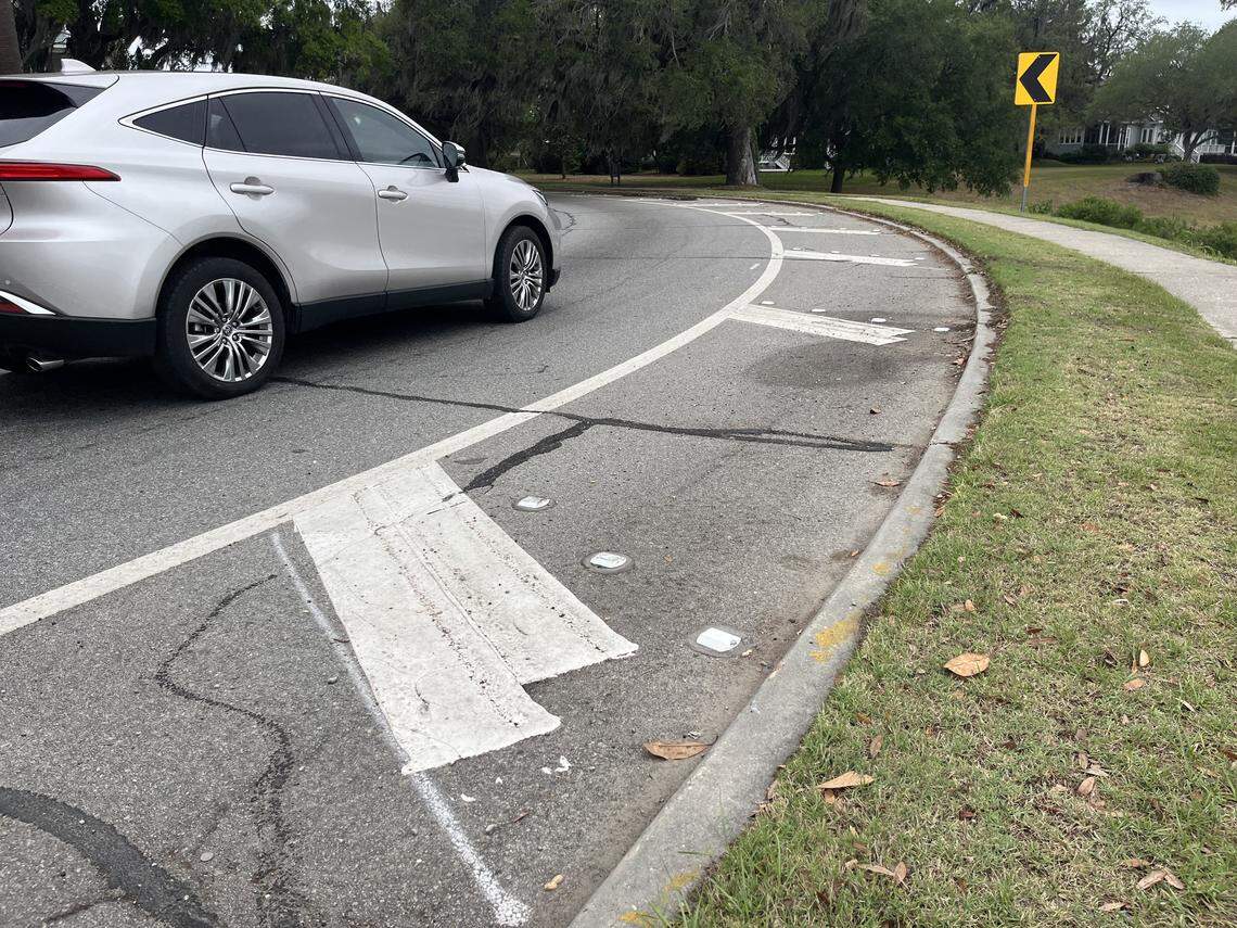 White stripes and raised markers have been installed along Bellamy Curve in Beaufort to alert drivers when they get to close to the edge of the road along the marsh.